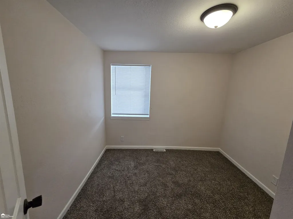 2164 E Whittemore Avenue Burton City MI 48529