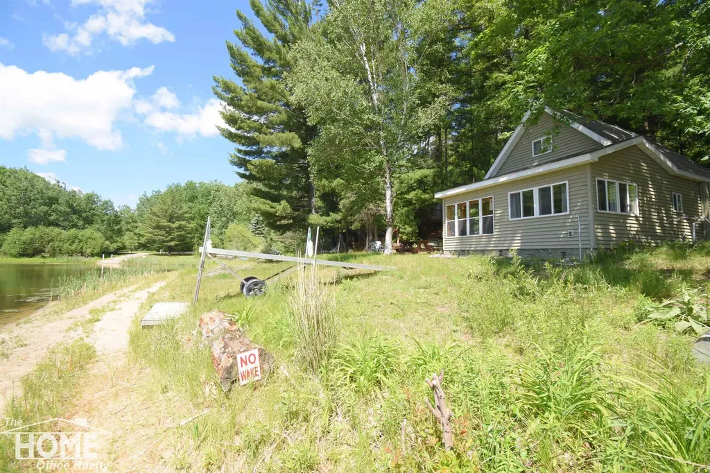 1121 & 1131 Lake Drive Lincoln Township MI 48625