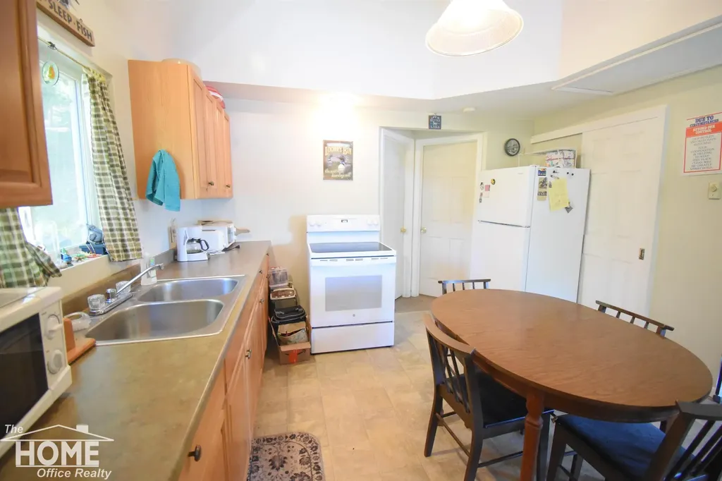 1121 & 1131 Lake Drive Lincoln Township MI 48625