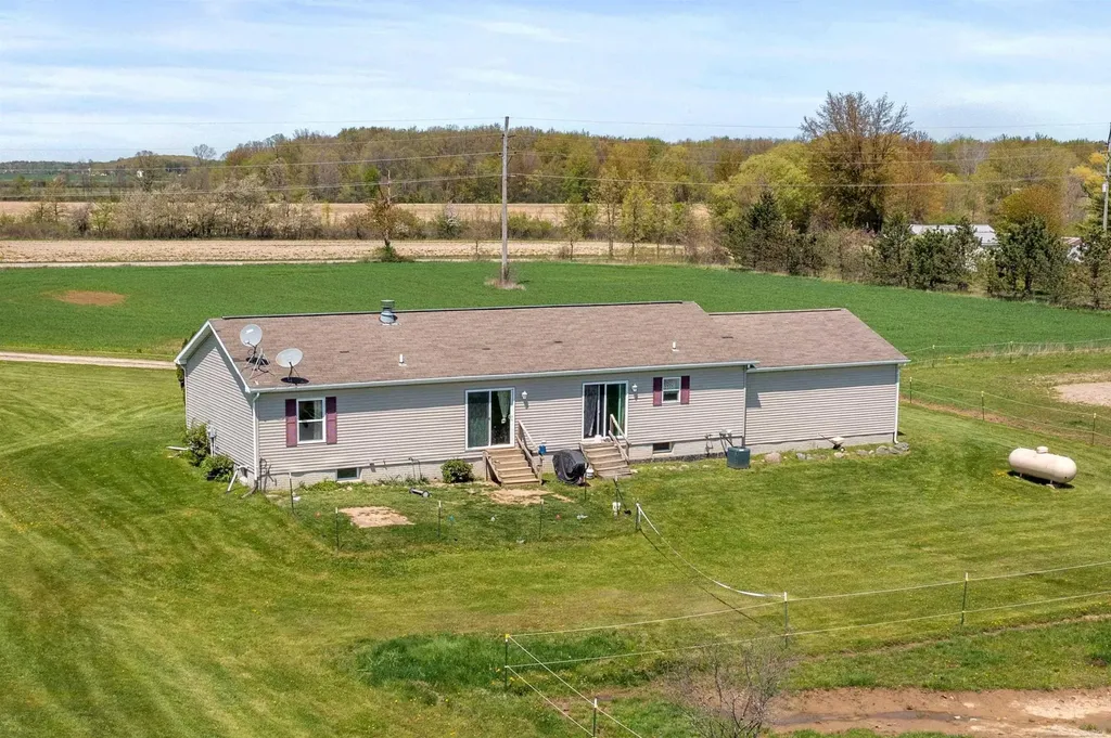 7613 Fisher Road Greenwood Township MI 48006