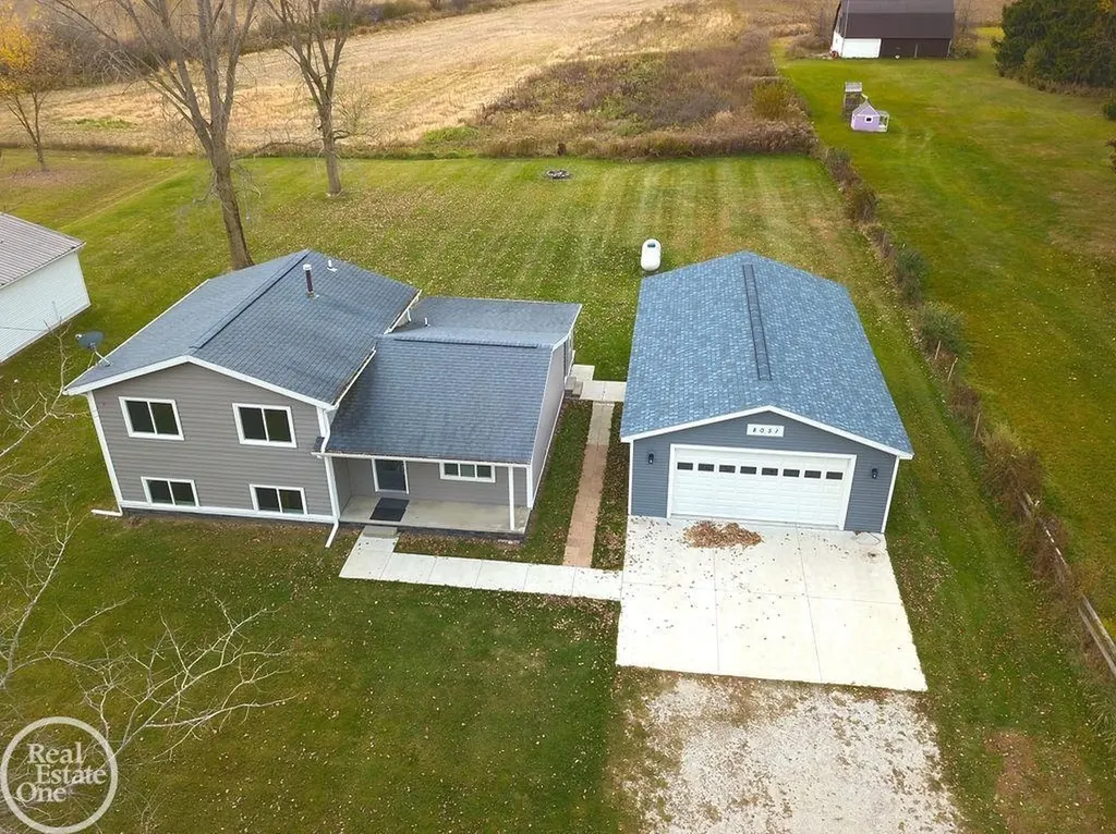8051 Logana Road Greenwood Township MI 48006