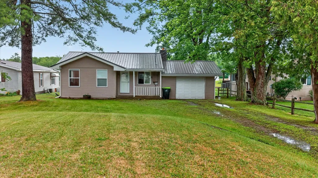 1043 Mckimmy Drive Tobacco Township MI 48612