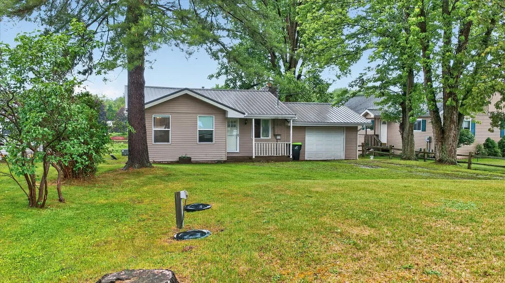 1043 Mckimmy Drive Tobacco Township MI 48612