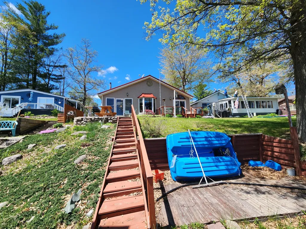 781 N Blue Gill Lake Frost Township MI 48625