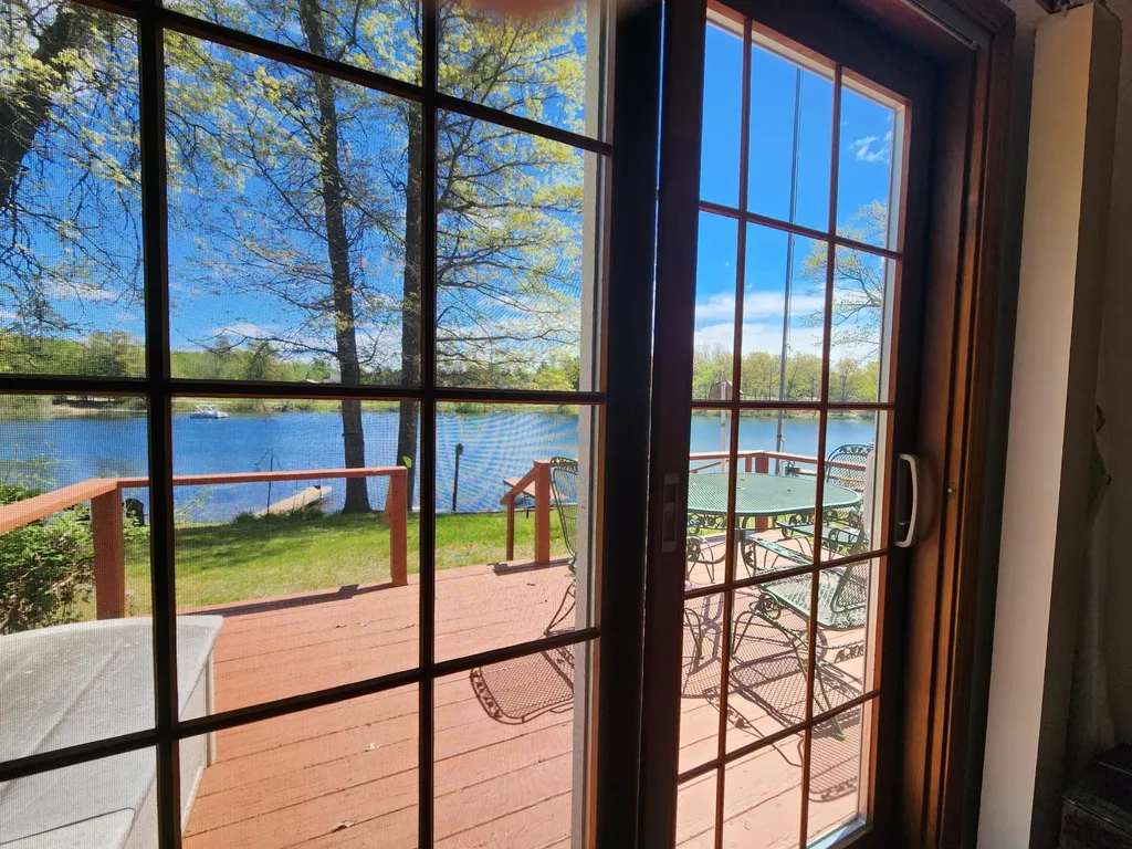 781 N Blue Gill Lake Frost Township MI 48625