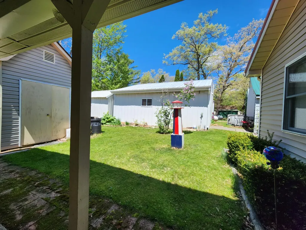 781 N Blue Gill Lake Frost Township MI 48625