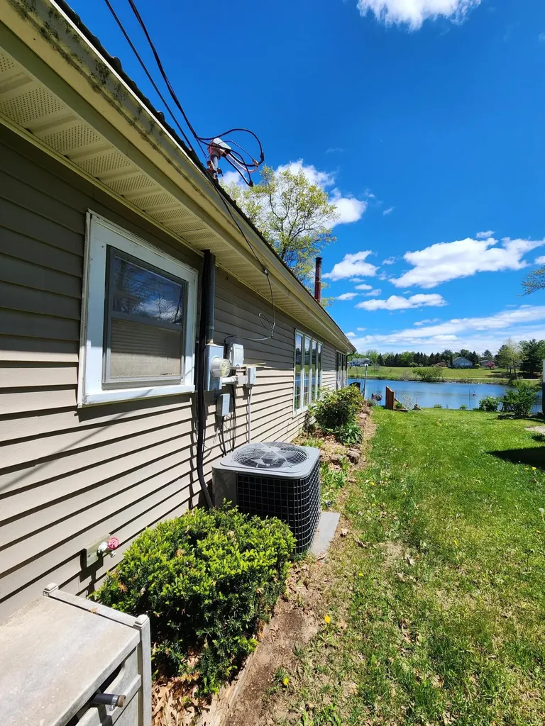 781 N Blue Gill Lake Frost Township MI 48625