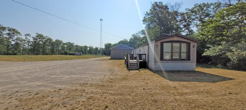 6634 N Woodbridge Road Merrill Township MI 49349