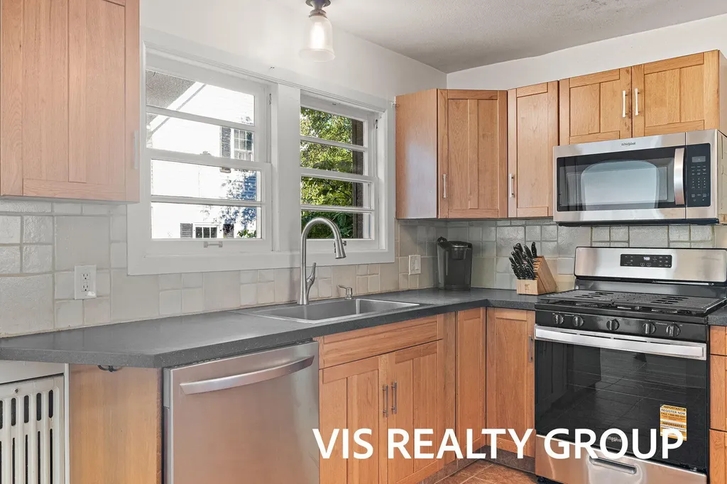 303 E Savidge Street Spring Lake Village MI 49456