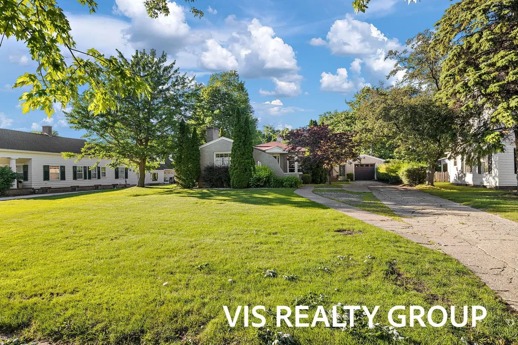 303 E Savidge Street Spring Lake Village MI 49456