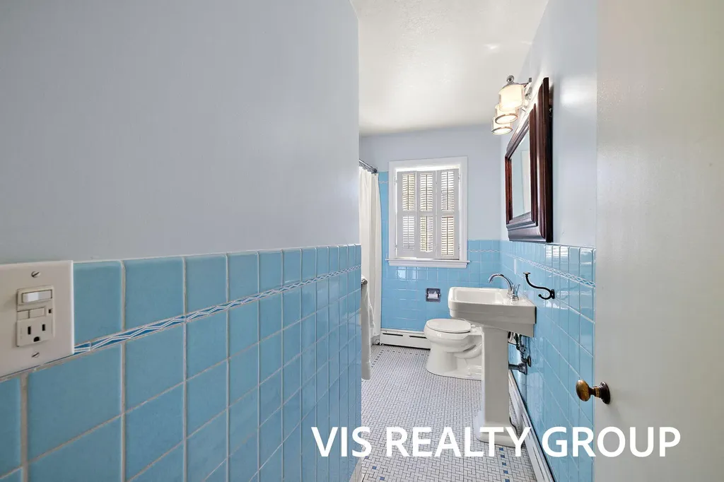 303 E Savidge Street Spring Lake Village MI 49456