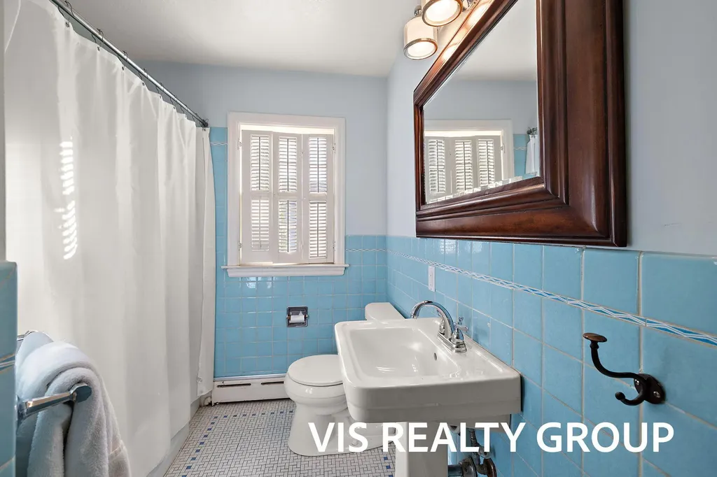 303 E Savidge Street Spring Lake Village MI 49456