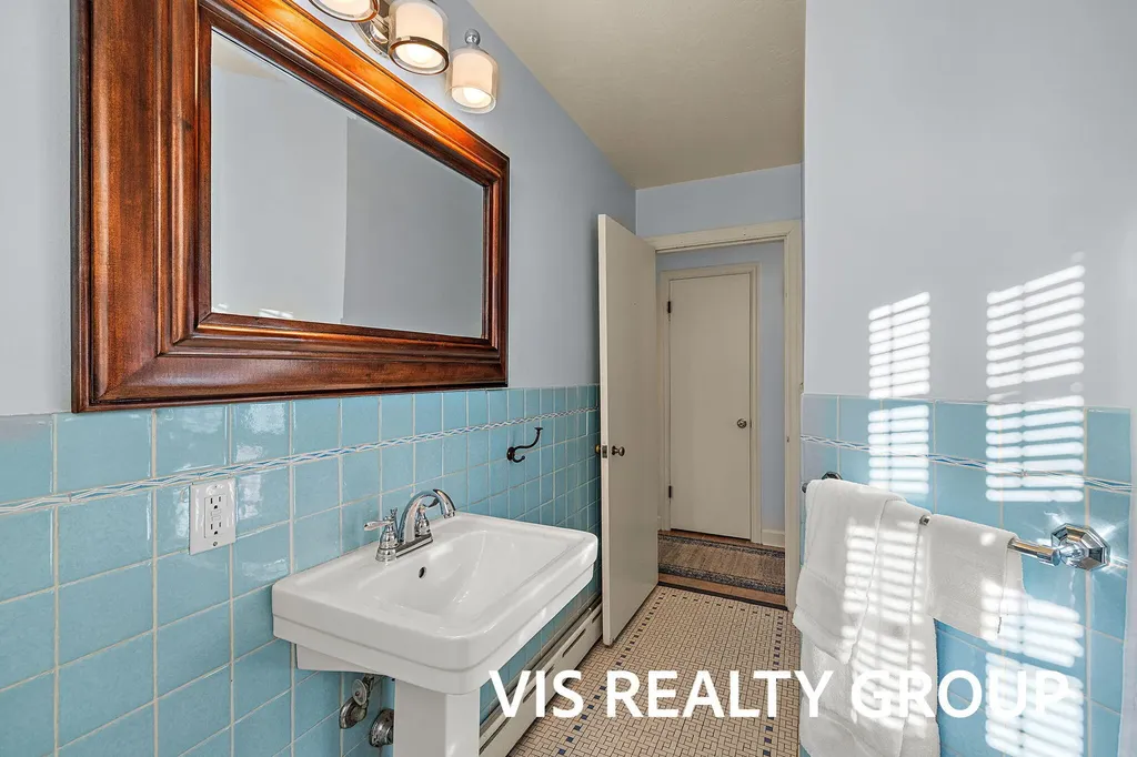 303 E Savidge Street Spring Lake Village MI 49456