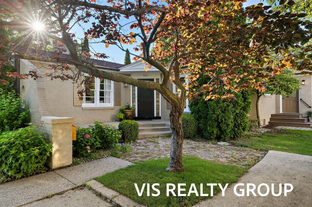 303 E Savidge Street Spring Lake Village MI 49456