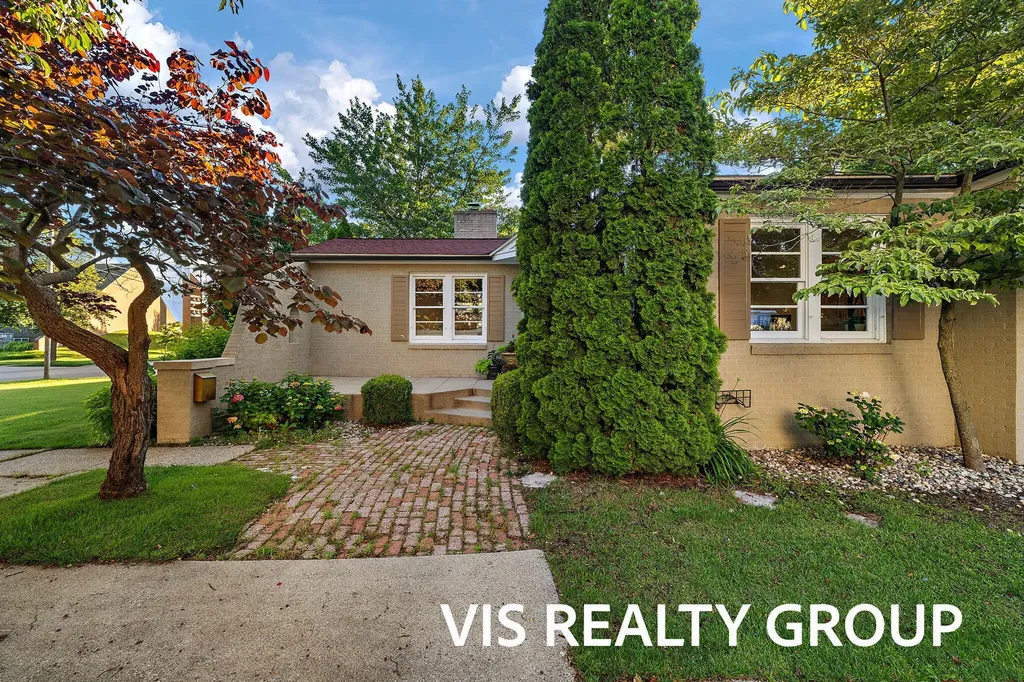 303 E Savidge Street Spring Lake Village MI 49456