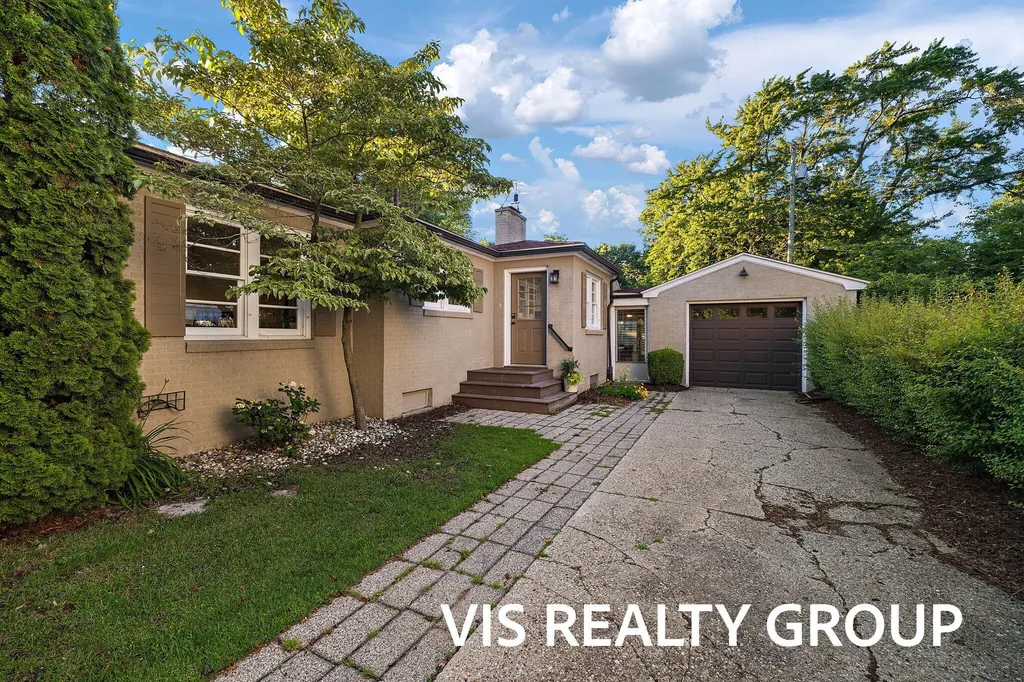 303 E Savidge Street Spring Lake Village MI 49456