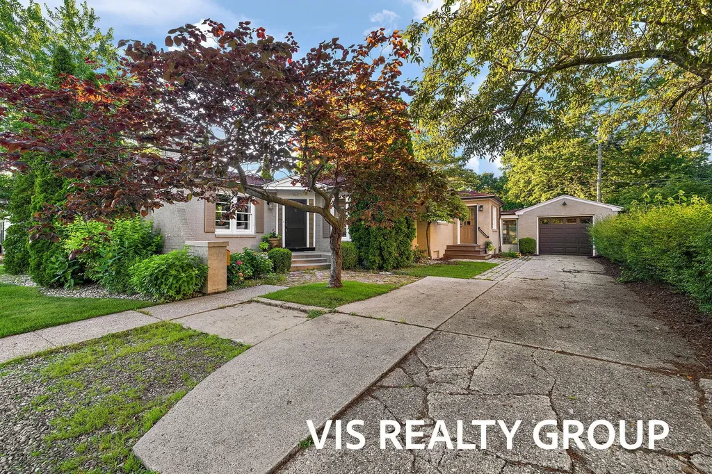 303 E Savidge Street Spring Lake Village MI 49456