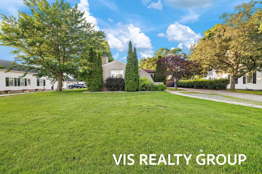 303 E Savidge Street Spring Lake Village MI 49456