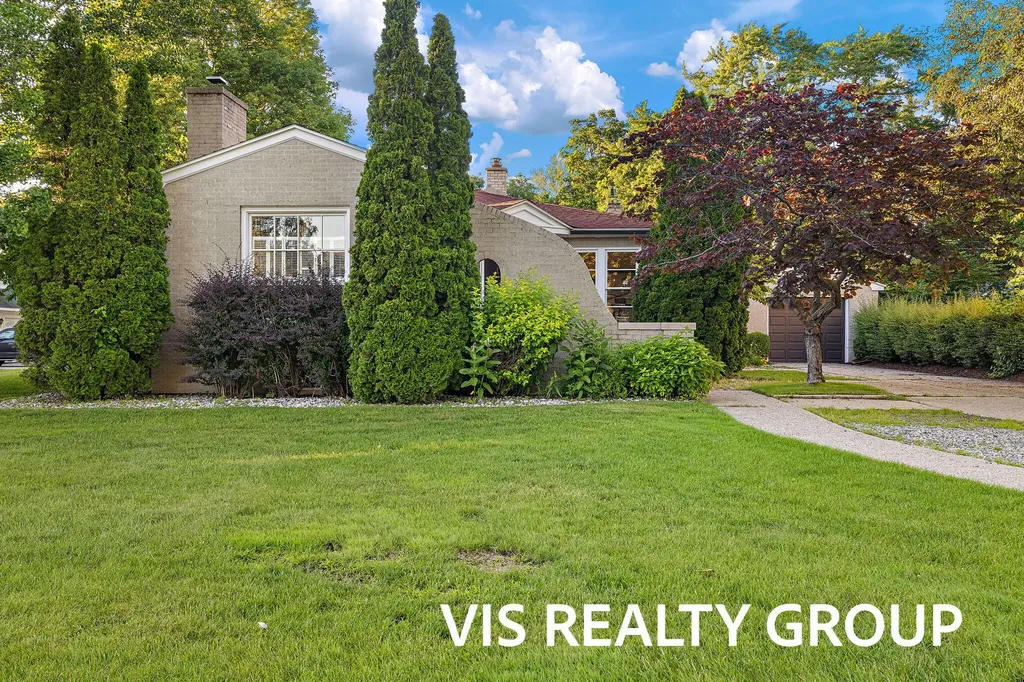 303 E Savidge Street Spring Lake Village MI 49456
