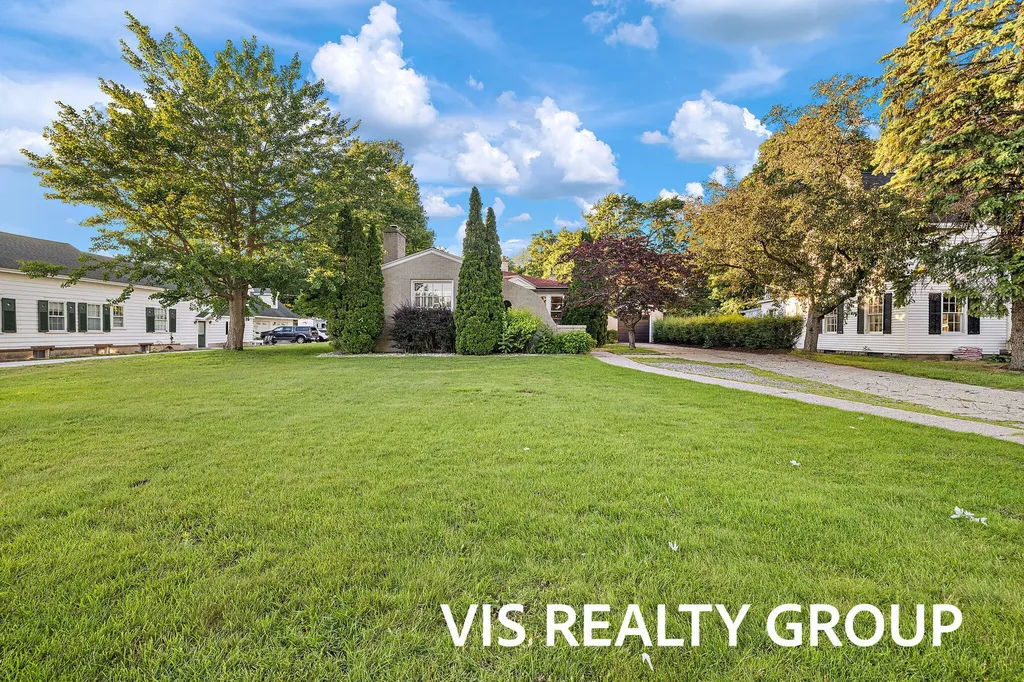 303 E Savidge Street Spring Lake Village MI 49456
