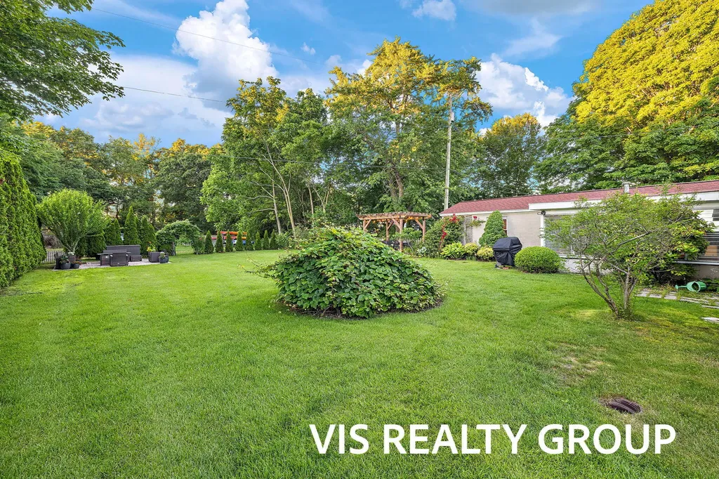 303 E Savidge Street Spring Lake Village MI 49456