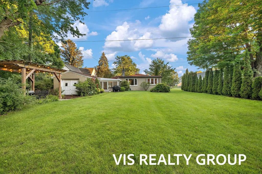 303 E Savidge Street Spring Lake Village MI 49456