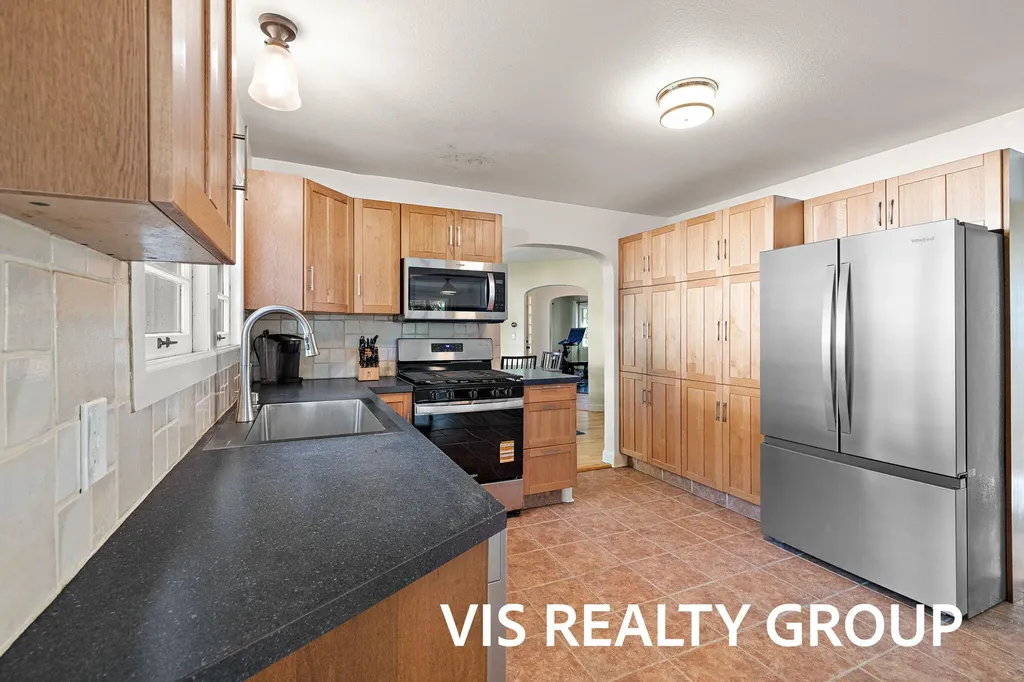 303 E Savidge Street Spring Lake Village MI 49456