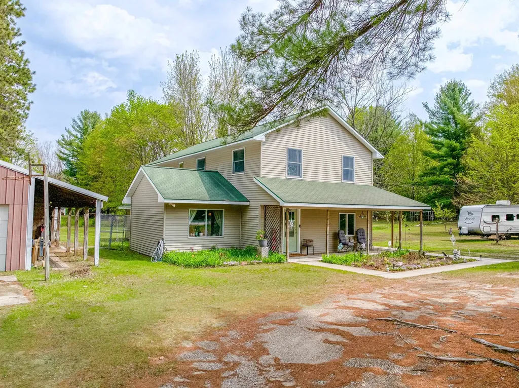 10942 Thiel Road Long Lake Township MI 49685