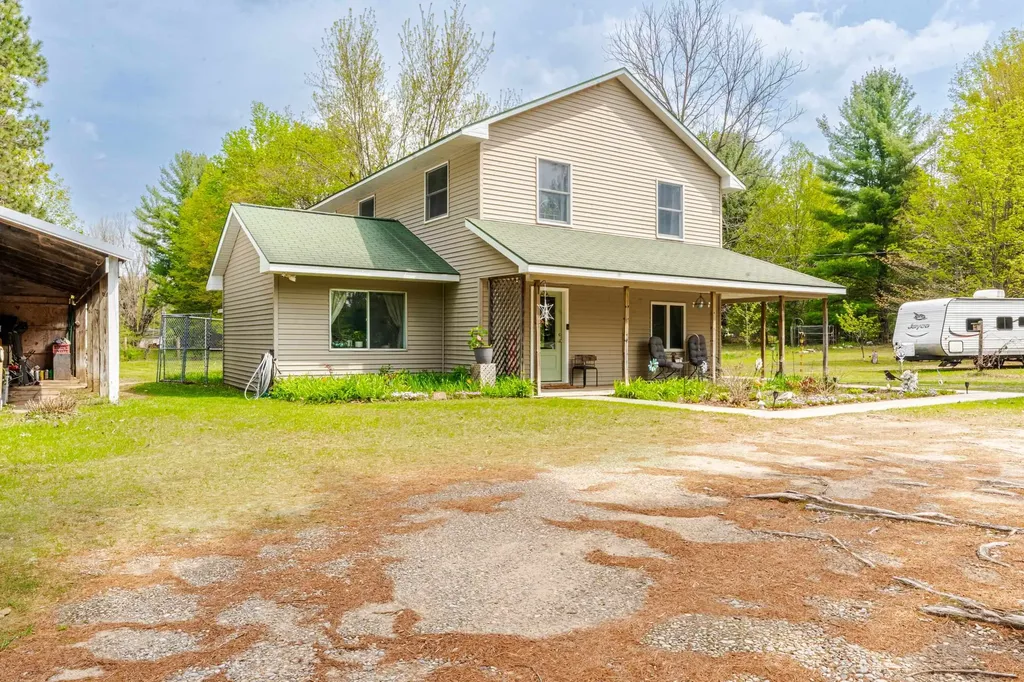 10942 Thiel Road Long Lake Township MI 49685