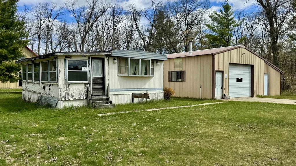 1496 17 Mile Road Middle Branch Township MI 49665