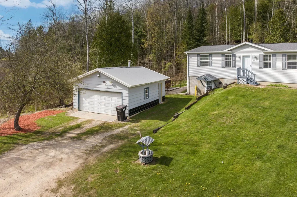 25 E River Road East Bay Township MI 49696