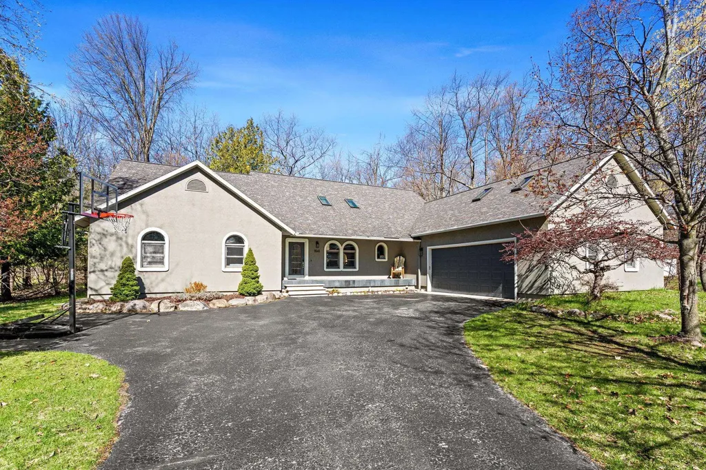 9045 North Pointe Woods Charlevoix Township MI 49720