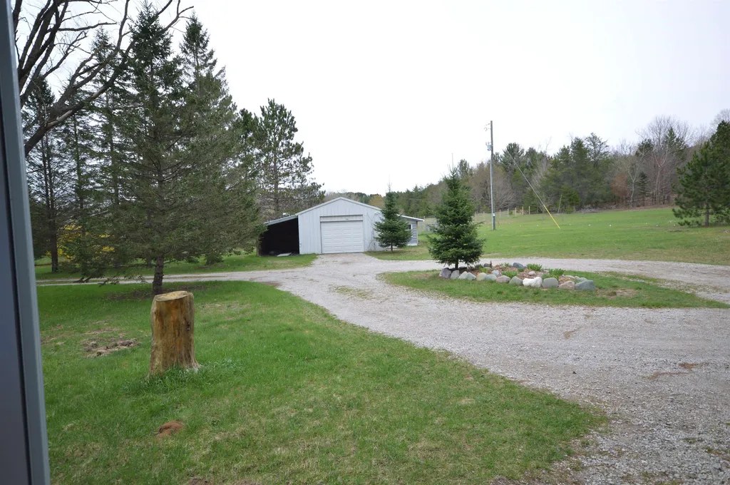 6215 S Garfield Road, S Paradise Township MI 49649