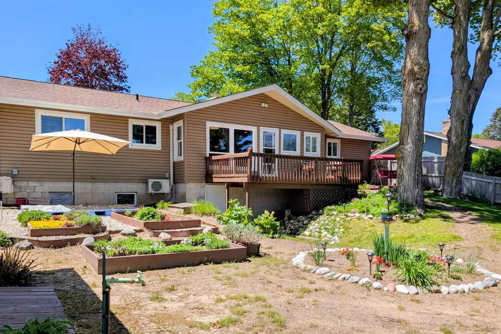 704 Green Acres Forest Home Township MI 49615