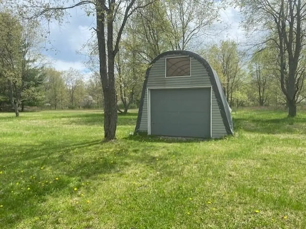 10559 Rosted Road Lake Township MI 49651