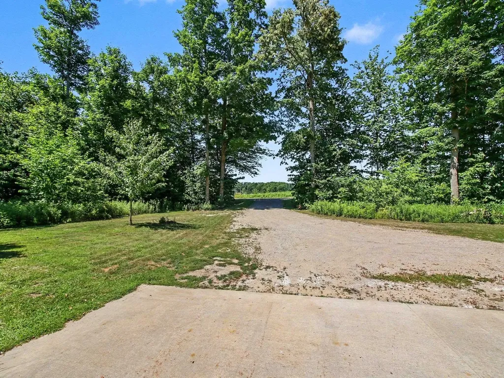 10212 E 48 Road Clam Lake Township MI 49601