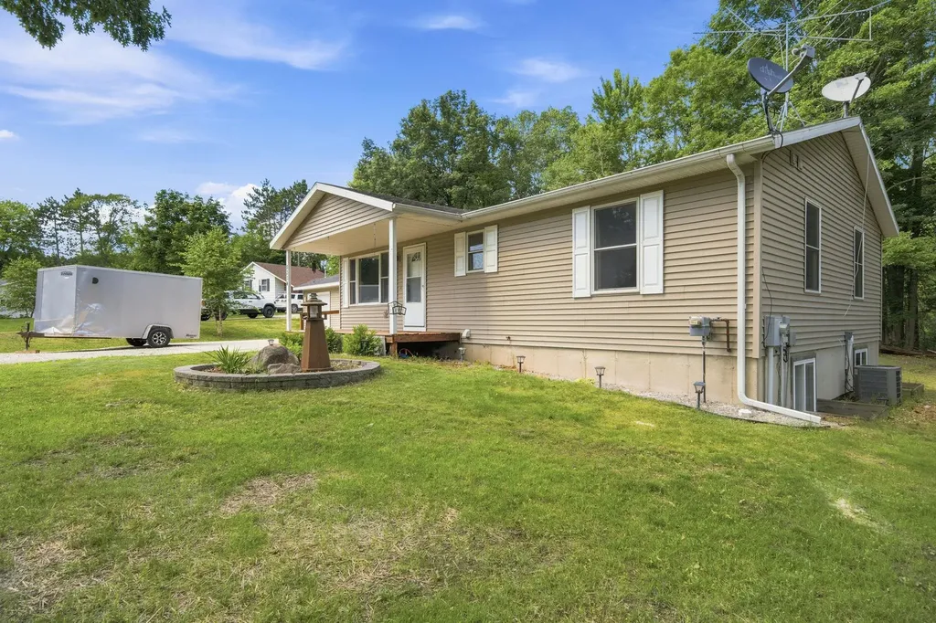 8304 W Whispering Pine Circle Lake Township MI 49651