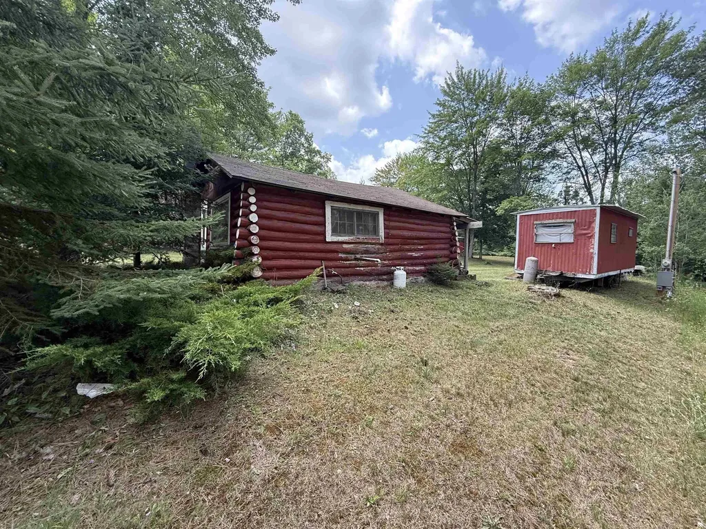 13276 S Sharon Road, SE Garfield Township MI 49633