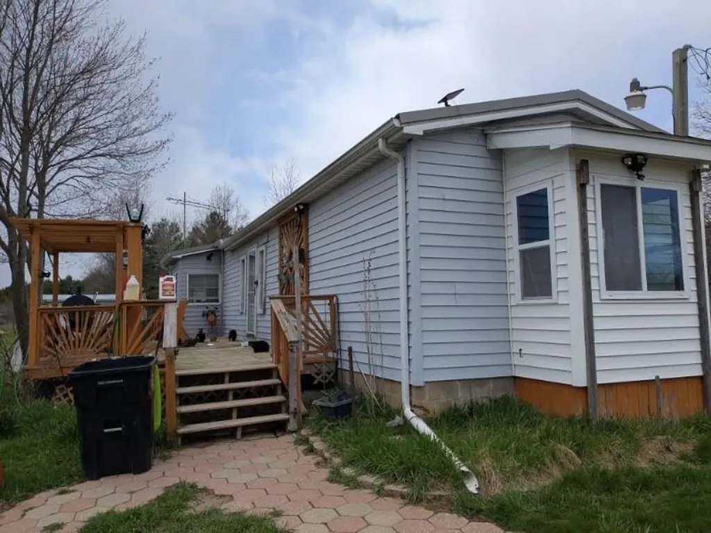 6283 Plant Road Burleigh Township MI 48770