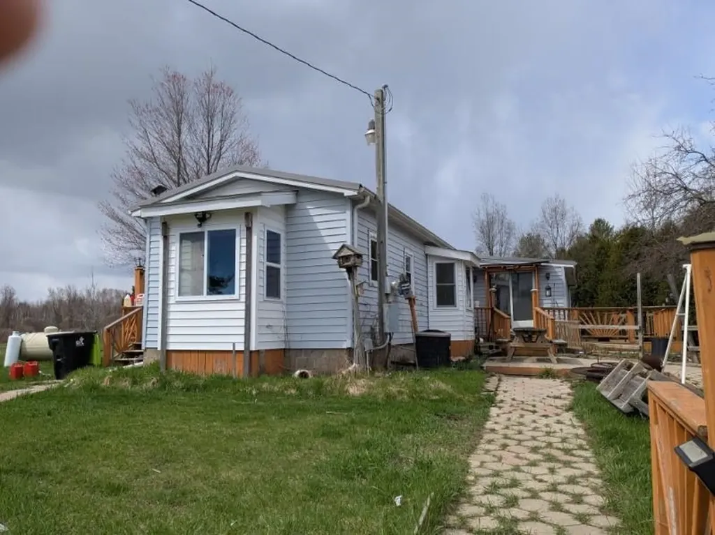 6283 Plant Road Burleigh Township MI 48770
