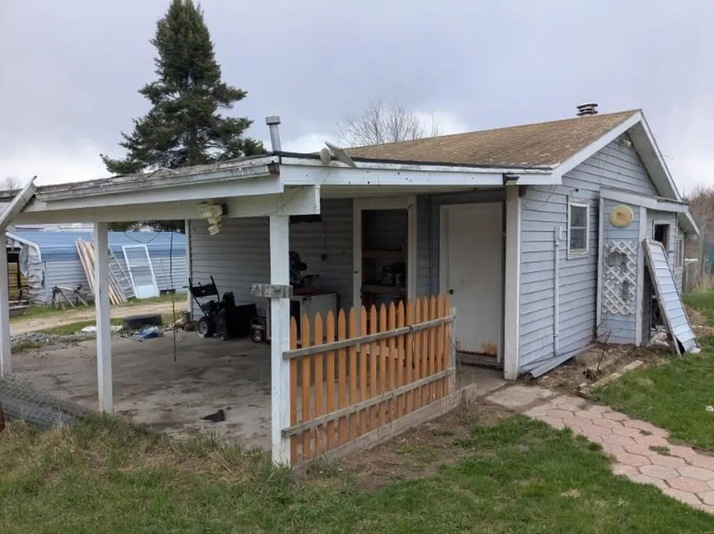6283 Plant Road Burleigh Township MI 48770
