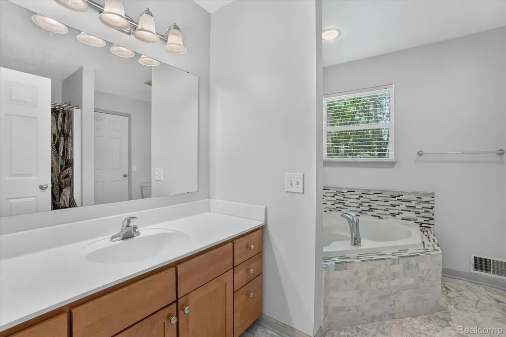 5677 Cartago Drive Delhi Charter Township MI 48911