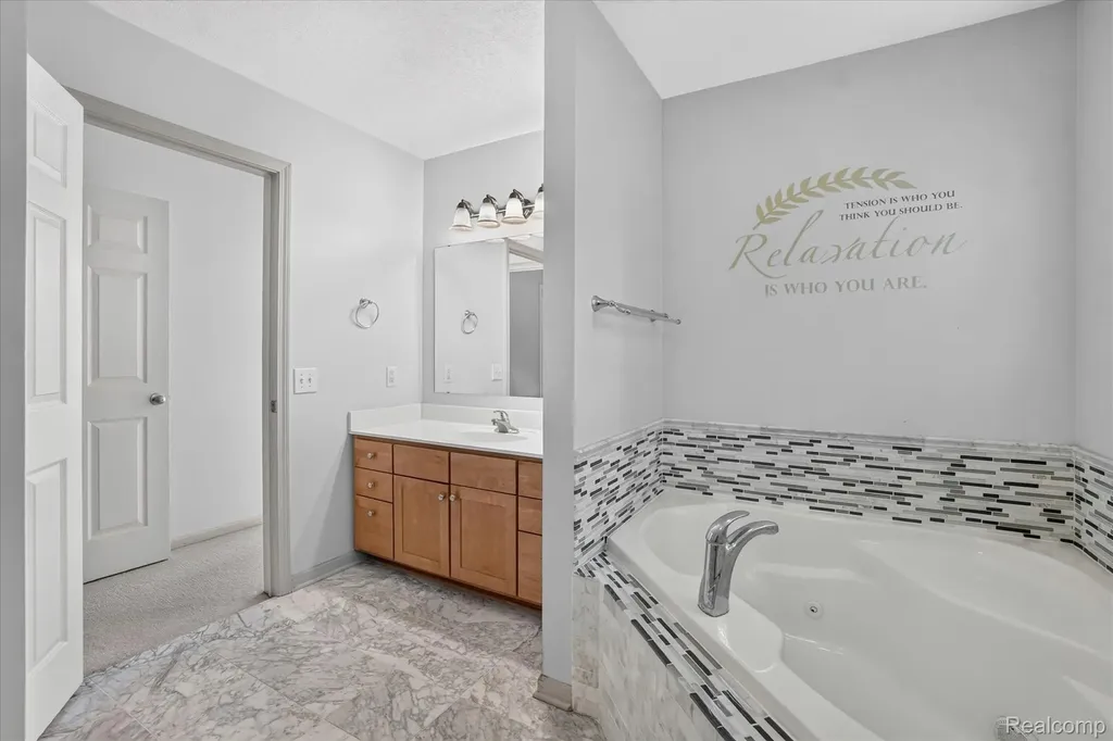 5677 Cartago Drive Delhi Charter Township MI 48911