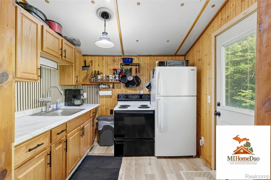 6960 Rumsay Street Hamilton Township MI 48625