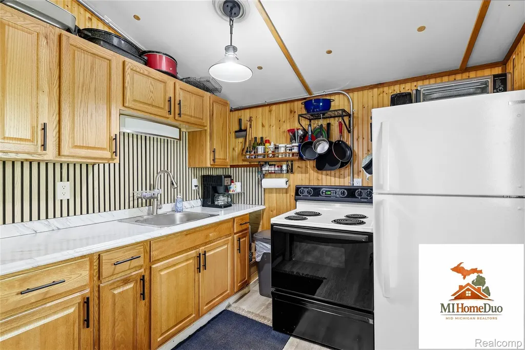 6960 Rumsay Street Hamilton Township MI 48625