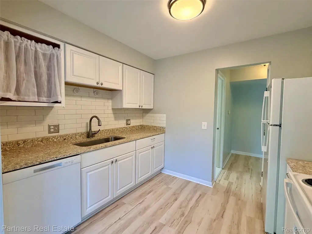 507 W Highland Road Howell City MI 48843