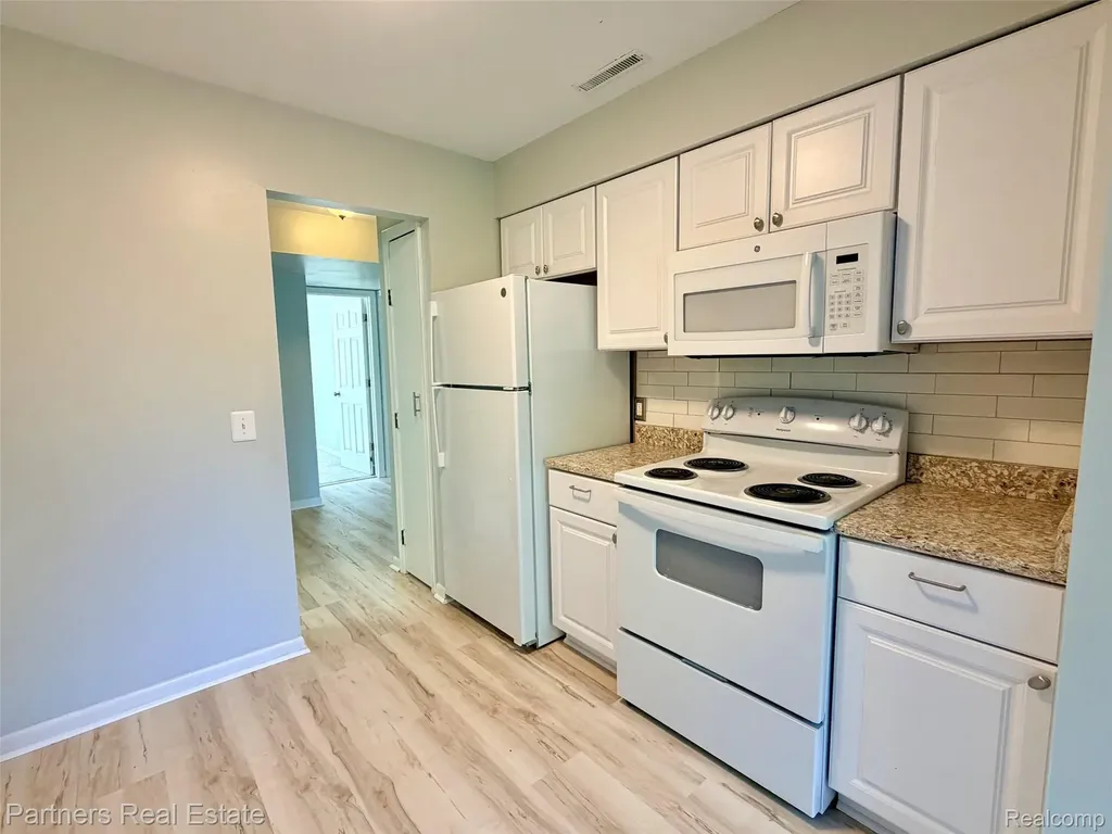 507 W Highland Road Howell City MI 48843