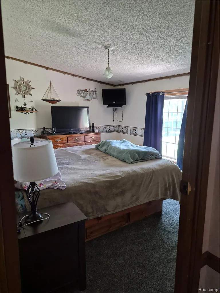 12849 S Delaney Road Perry City MI 48872