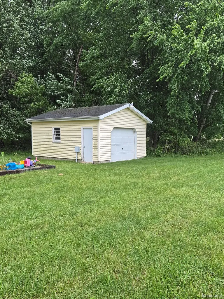12849 S Delaney Road Perry City MI 48872
