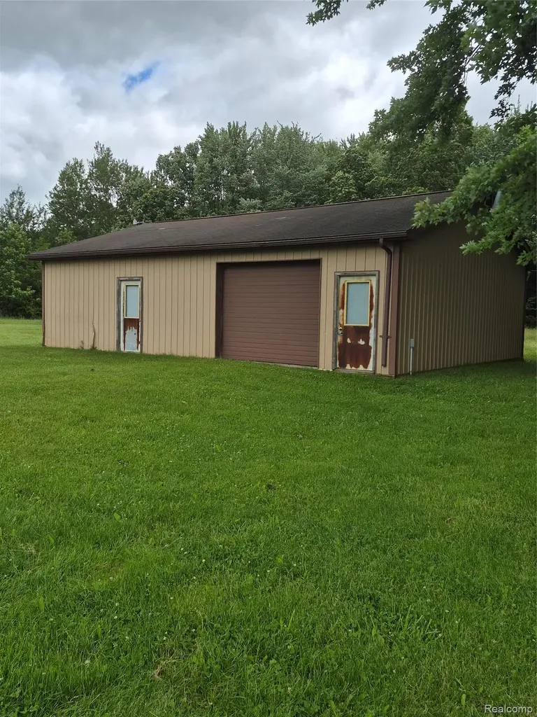 12849 S Delaney Road Perry City MI 48872